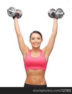 picture of young sporty woman with heavy steel dumbbells