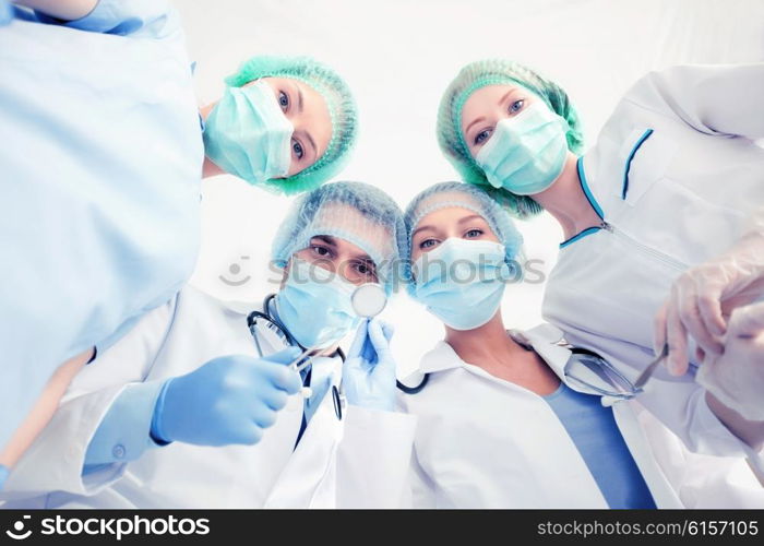 picture of young team or group of doctors in operating room. group of doctors in operating room