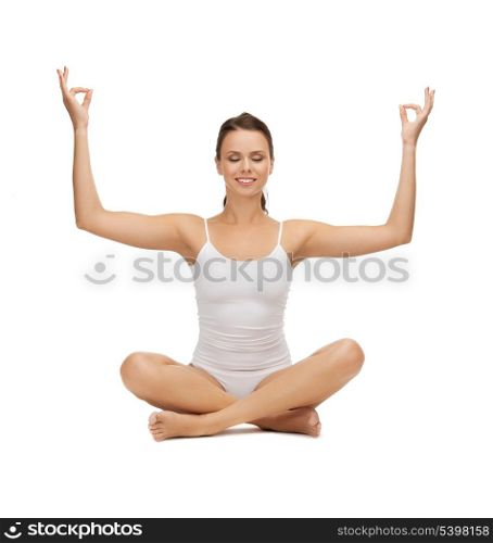 picture of young woman doing exercises, yoga, pilates