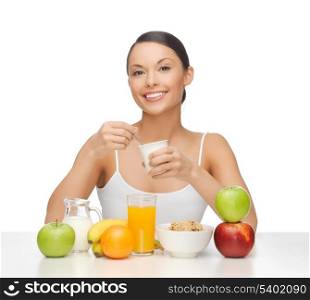 picture of young woman eating healthy breakfast
