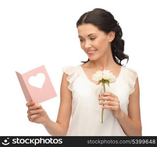 picture of young woman holding flower and postcard