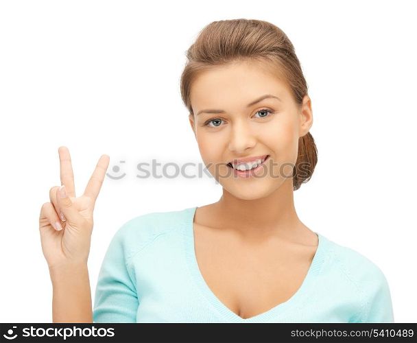 picture of young woman showing victory or peace sign