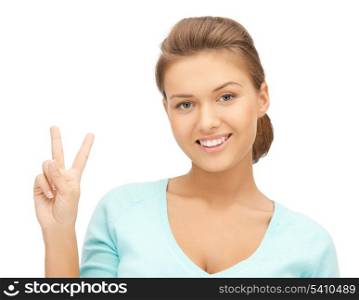 picture of young woman showing victory or peace sign