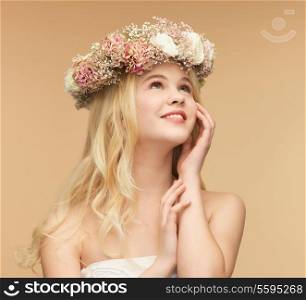 picture of young woman wearing wreath of flowers