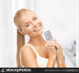 picture of young woman with one pack of pills