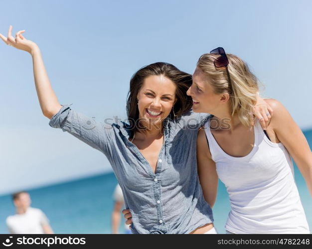 Picture women on the beach. A picture of two women having good time on beach