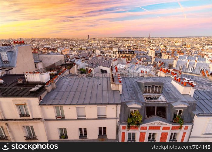 Picturesque aerial view of the city and the roofs in the early morning. Paris, France.. Paris. Scenic aerial view of the city in the early morning.