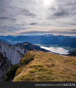 Picturesque autumn Alps mountain lakes view from Schafberg viewpoint, Salzkammergut, Upper Austria. Beautiful travel, hiking, seasonal, and nature beauty concept scene.