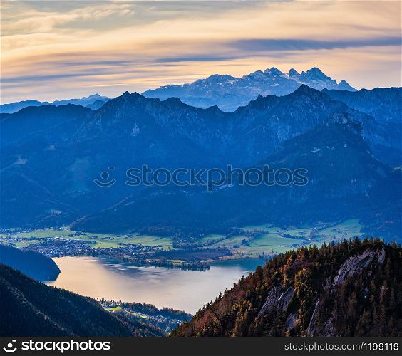 Picturesque autumn morning Alps mountain Wolfgangsee lake view from Schafberg viewpoint, Salzkammergut, Upper Austria. Beautiful travel, hiking, seasonal, and nature beauty concept scene.
