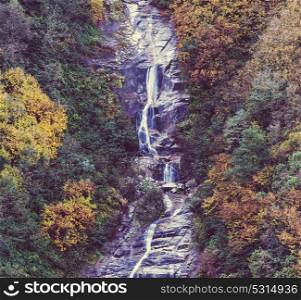 Picturesque autumn waterfall
