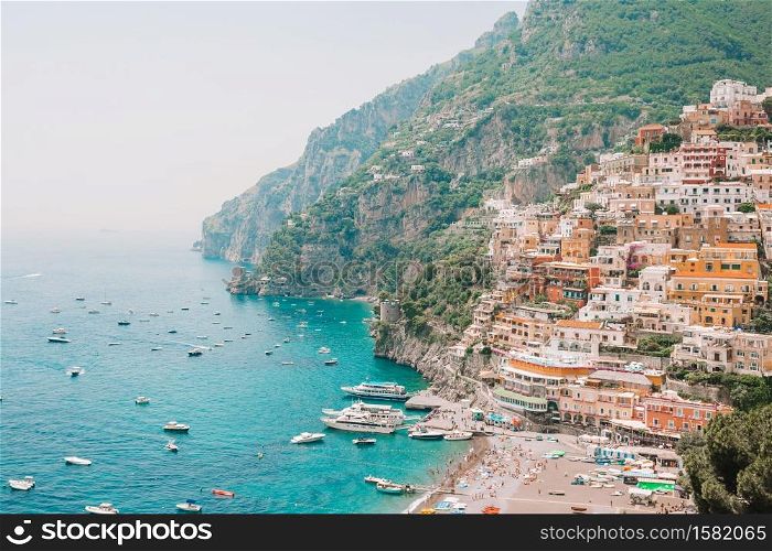 Picturesque famous and beautiful Positano, Amalfi Coast, Italy. View of popular Spiaggia Grande in Positano. Beautiful coastal towns of Italy - scenic Positano in Amalfi coast