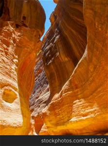 Picturesque gorge with rocks of red sandstone in Petra, Jordan