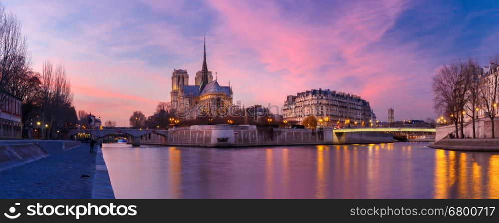 Picturesque grandiose sunset over Cathedral of Notre Dame de Paris, France. Panorama