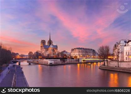 Picturesque grandiose sunset over Ile de la Cite, Seine River and Cathedral of Notre Dame de Paris, France