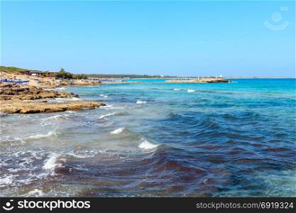 Picturesque Ionian sea beach Punta della Suina near Gallipoli&rsquo;s town in Salento, Puglia, Italy. People unrecognizable.