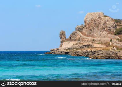 Picturesque Ionian sea coast near Montagna Spaccata rock, Santa Maria Al Bagno, Gallipoli, Salento, Puglia, Italy.