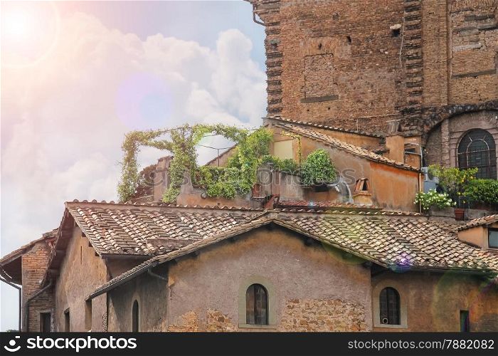Picturesque Italian house with flowers on the terrace