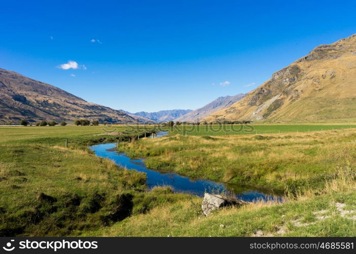 Picturesque landscape. Natural landscape of New Zealand alps and stream