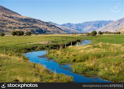 Picturesque landscape. Natural landscape of New Zealand alps and stream