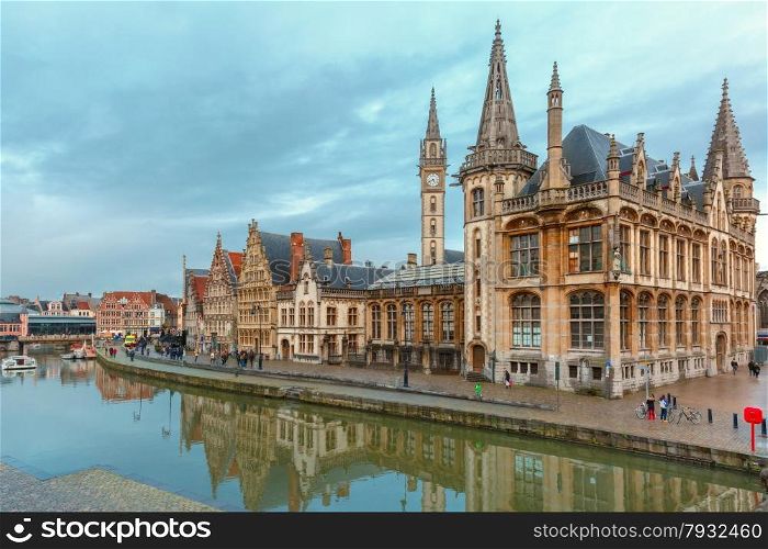 Picturesque medieval building and Post palace on the quay Graslei in Leie river at Ghent town at morning, Belgium