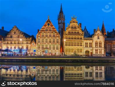 Picturesque medieval building on the quay Graslei in Leie river at Ghent town at evening, Belgium