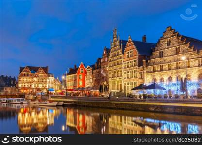 Picturesque medieval buildings on the quay Graslei in Leie river at Ghent town at morning, Belgium