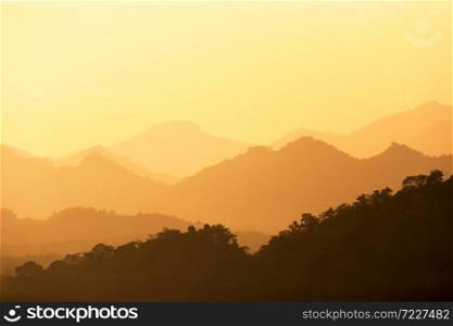 Picturesque mountain range at sunset, scenery mountain range on winter dusk, a tranquil view from Phou si summit. World Heritage Site, Luang Prabang, Laos.