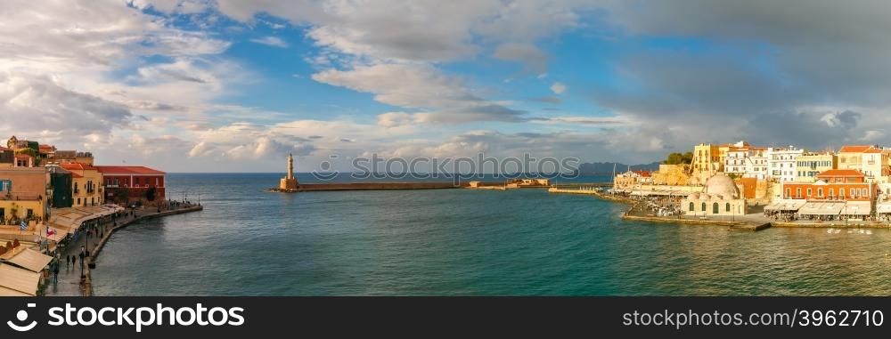 Picturesque panoramic view of old harbour of Chania with Lighthouse and Kucuk Hasan Pasha Mosque, Crete, Greece