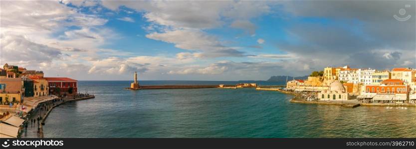 Picturesque panoramic view of old harbour of Chania with Lighthouse and Kucuk Hasan Pasha Mosque, Crete, Greece