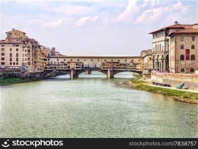 Picturesque Ponte Vecchio bridge in Florence old town in Tuscany, Italy.