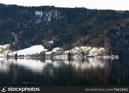 Picturesque reflections in a lake, near Zug, in Switzerland