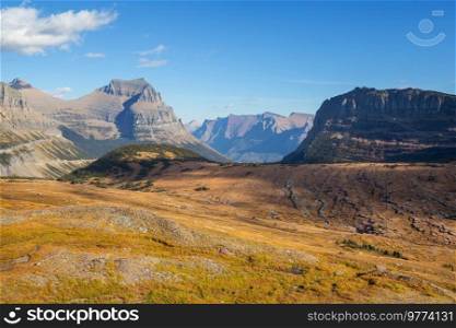 Picturesque rocky peaks of the Glacier National Park, Montana, USA. Autumn season. Beautiful natural landscapes.