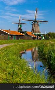 Picturesque rural landscape with windmills in Zaanse Schans, Holland, Netherlands