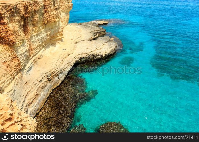 Picturesque seascape with cliffs, at Torre Sant Andrea, Salento sea coast, Puglia, Italy.