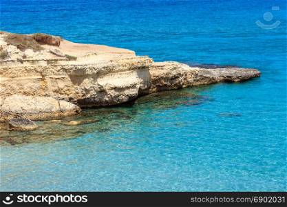 Picturesque seascape with white rocky cliffs (Spiaggia della Punticeddha, Salento, Adriatic sea coast, Puglia, Italy)