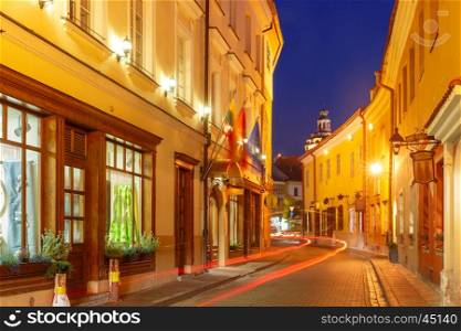 Picturesque Street at night in Old Town of Vilnius, Lithuania, Baltic states.