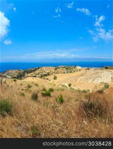 Picturesque summer view to sea and Sicily island in far from mountain hills in Motta San Giovanni outskirts, Reggio Calabria, Italy. Two shots stitch image.. Sea and Sicily island in far, Motta San Giovanni outskirts, Ital