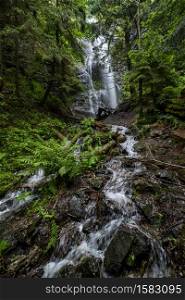 Picturesque summer Yalyn waterfall, highest waterfall in Ukrainian Carpathian Mountains, Marmaros.