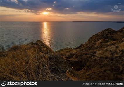 Picturesque sunset landscape of Stanislav clay mountains and canyons above Dnipro river bay near the Black sea, Ukraine, Kherson Grand Canyon.