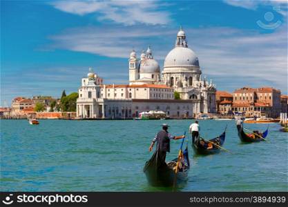 Picturesque view of Gondolas on Canal Grande with Basilica di Santa Maria della Salute in the background, Venice, Italy