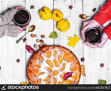 Pie with autumn quinces. Warm aromatic tea in hand and pie with autumn quince