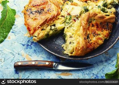 Pie with cheese and herbs. Pie or quiche with soft cheese filling.. Homemade cheese pie with spinach