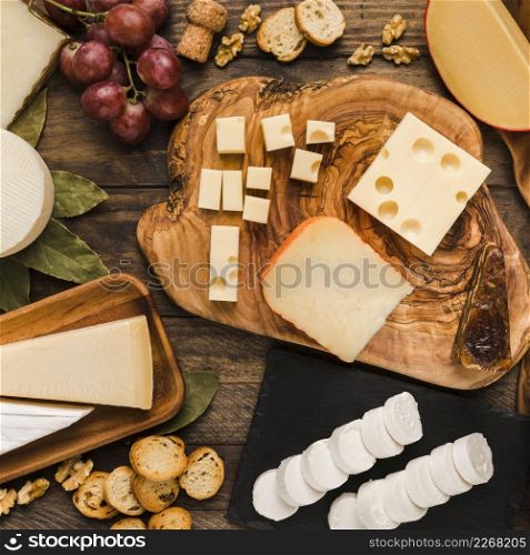 piece natural cheeses cheese board with tasty ingredient wooden desk