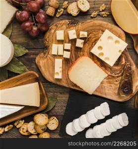 piece natural cheeses cheese board with tasty ingredient wooden desk