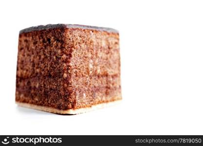 piece of a chocolate cake from front. piece of a chocolate cake from front on white background