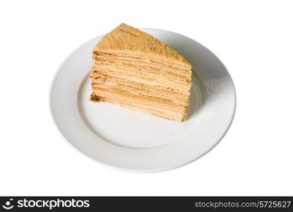 Piece of a pie at plate on white