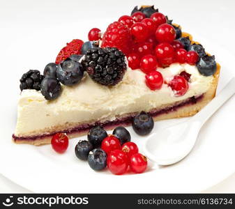 Piece of a pie with fresh berries