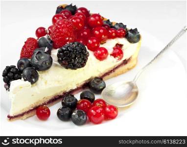 Piece of a pie with fresh berries
