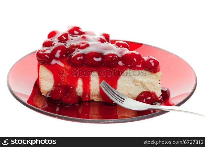 Piece of cherry cheese cake isolated on white background