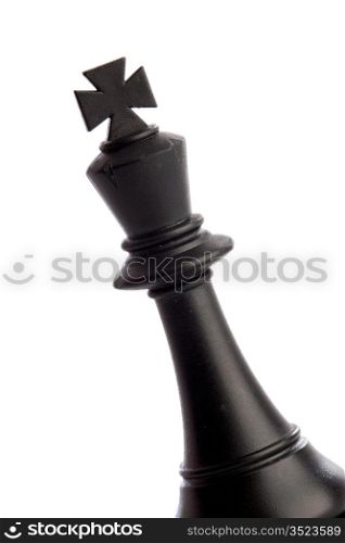 Piece of chess. The king standing on a white background